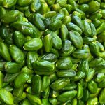 Familiarity with how to produce green peeled pistachio kernels